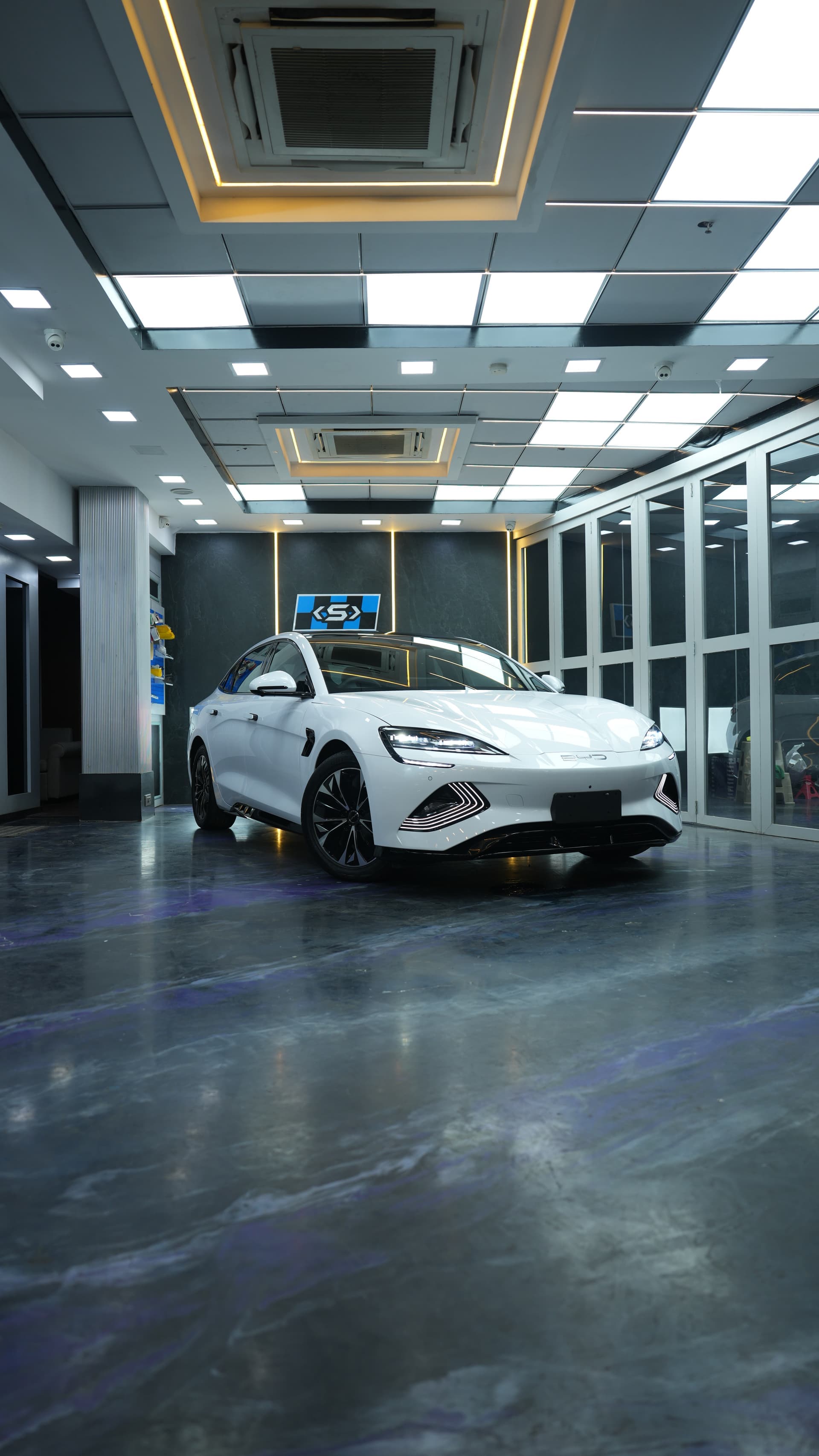 Car on the service bay floor at the Carsuit Mumbai studio