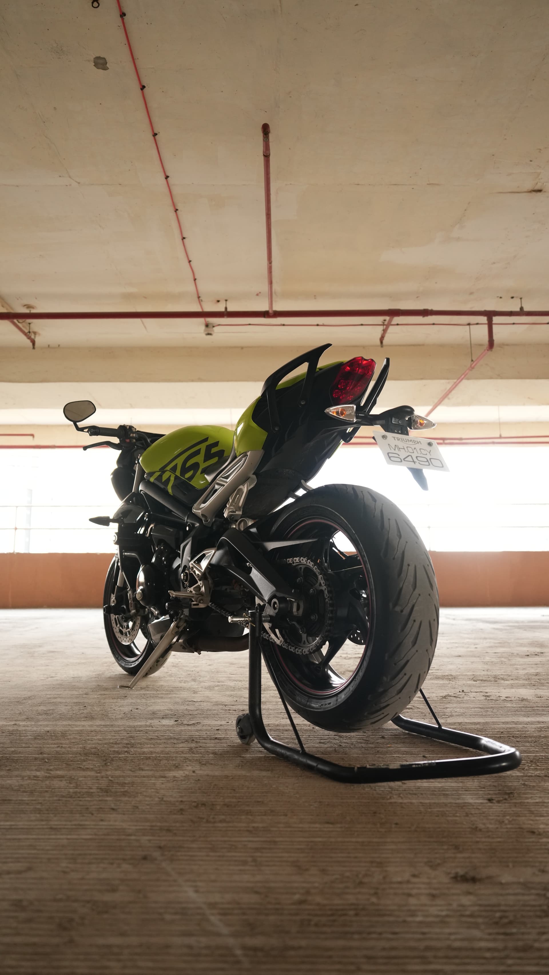 Triumph Street Triple 765 with full-body paint protection film at Carsuit Mumbai